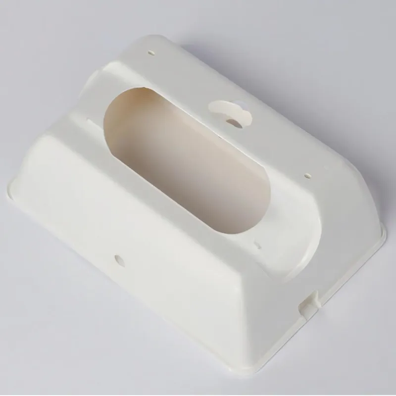 A white plastic wall mount with a rectangular opening and a hole for mounting.