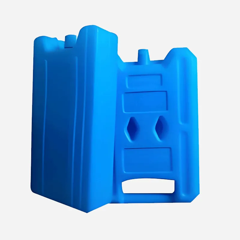 A blue plastic traffic barrier with a handle and geometric patterns.