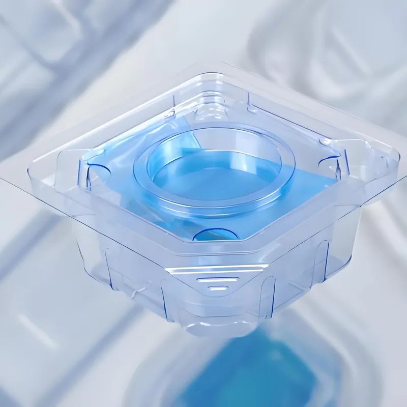 A transparent plastic container with a circular compartment and a blue liquid inside.