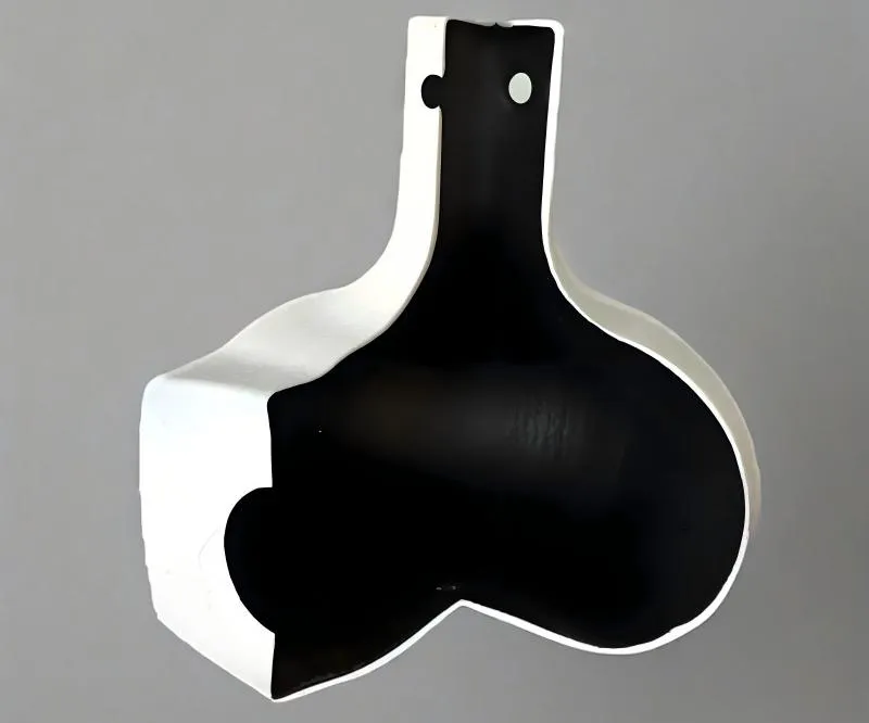 Cross-section of a tee pipe fitting showing internal structure.