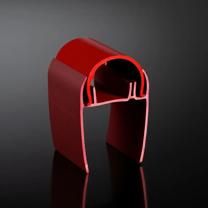 A red aluminum profile piece with a cross-sectional view on a dark background.