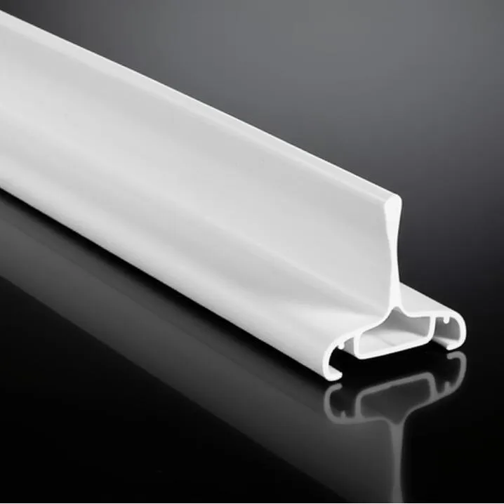 White PVC skirting board on a reflective surface.